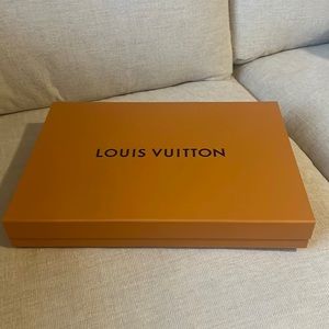 Large Louis Vuitton box with ribbon